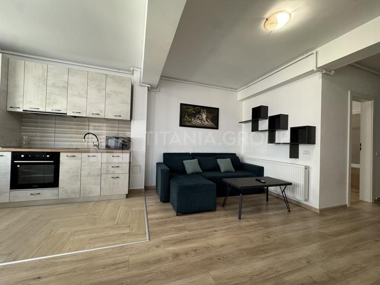 Apartament cu 2 camere semidecomandat, mobilat în Tractorul