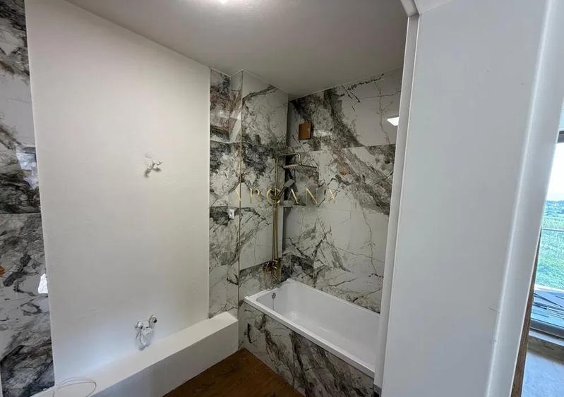 Apartament cu 3 camere semidecomandat, mobilat în Borhanci