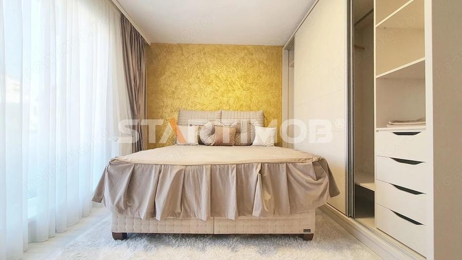 Apartament cu 3 camere decomandat în Tractorul