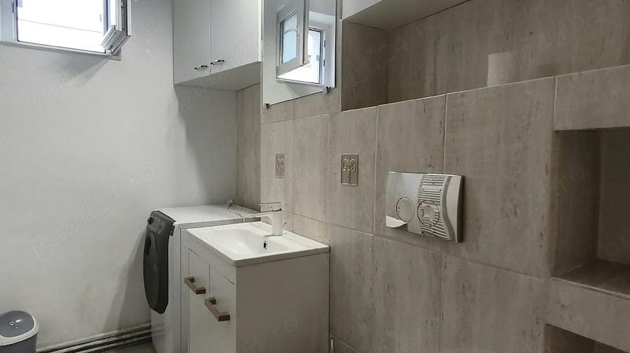 Apartament cu 4 camere decomandat în Central