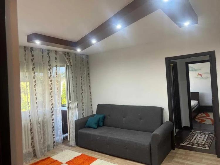 Apartament cu 2 camere semidecomandat în Podu Roș