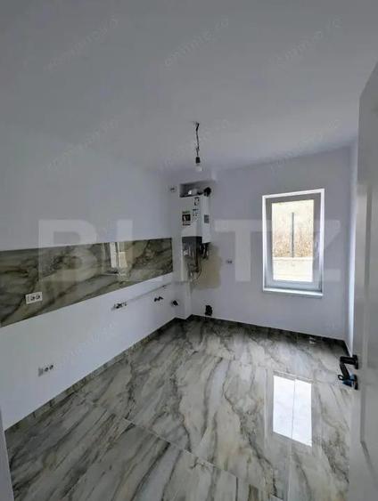 Casă cu 4 camere cu Teren 250 Mp în Bârnova