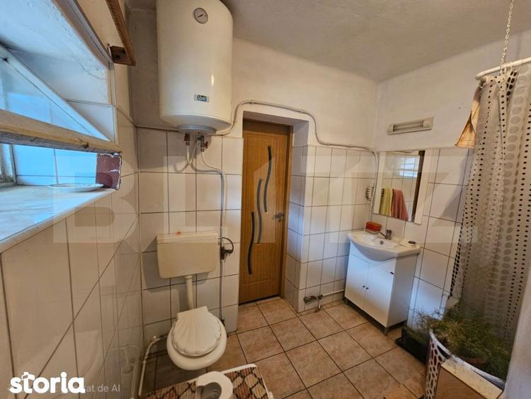 Casă cu 4 camere cu Teren 400 Mp în Central