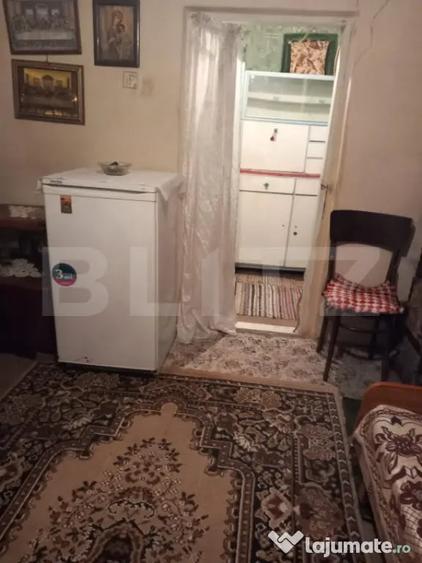 Casă cu 2 camere cu Teren 2000 Mp în Central