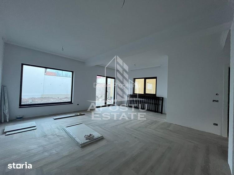 Duplex cu 4 camere, 3 bai,teren 250 mp in zona Dambovita