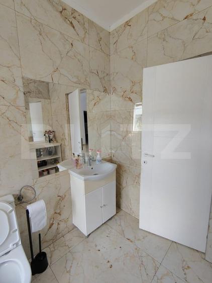 Casă individuală cu 4 camere cu Teren 1400 Mp în Suatu