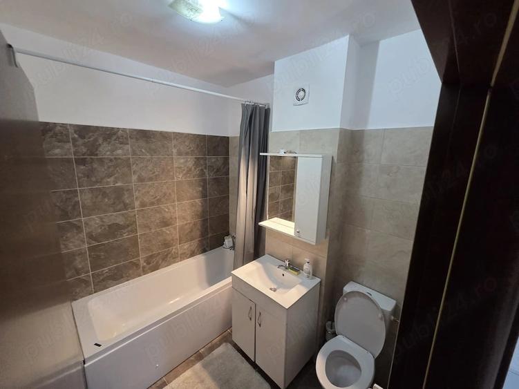 Garsonieră decomandată în Titan