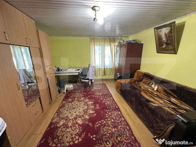 Casă cu 3 camere cu Teren 1500 Mp în Bucium