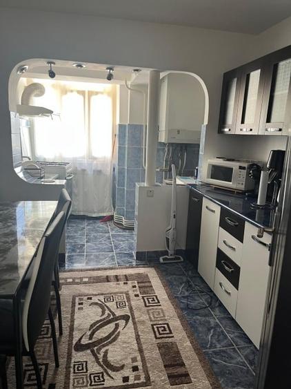 Apartament cu 2 camere semidecomandat, mobilat în Central