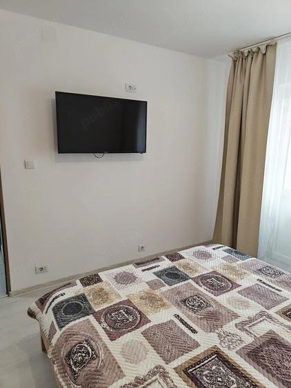 Apartament cu 3 camere semidecomandat în Tineretului