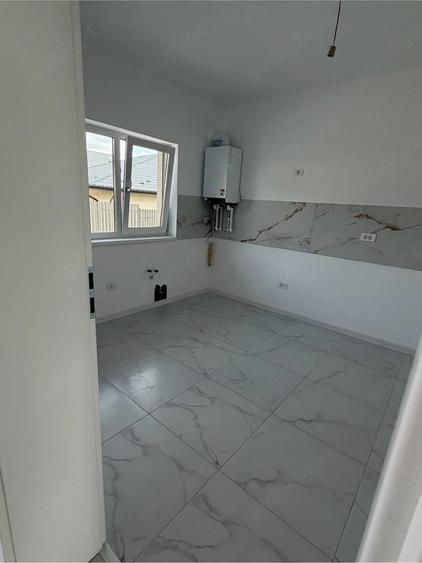Casă cu 4 camere cu Teren 506 Mp în Tomești