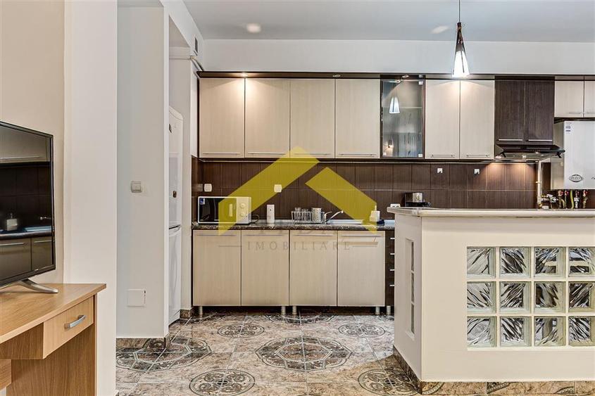 Apartament cu 2 camere semidecomandat, mobilat în UTA
