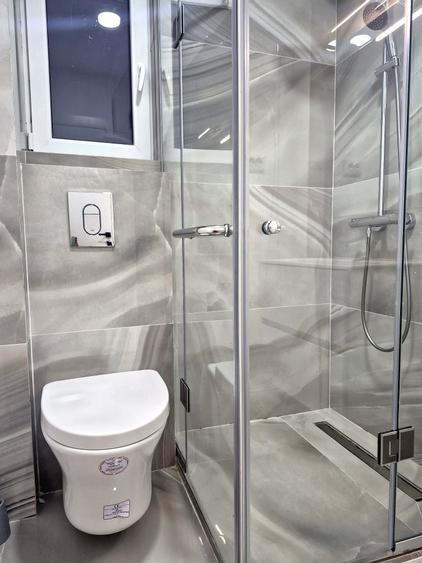 Apartament cu 3 camere decomandat în Polonă