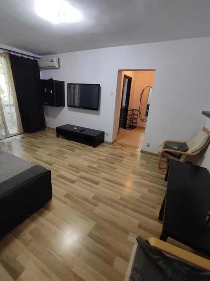 Apartament cu 2 camere semidecomandat, mobilat în Costin Georgian