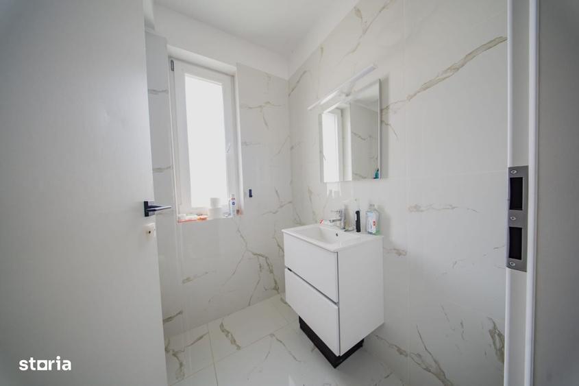 Casă cu 4 camere în Tunari