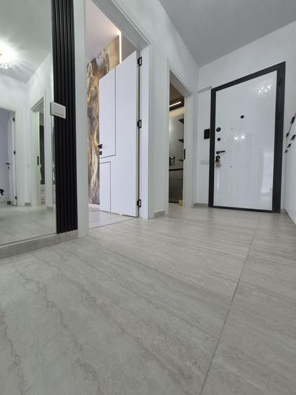 Apartament cu 3 camere decomandat în Ozana