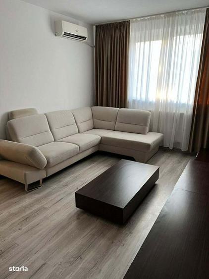 Apartament cu 3 camere semidecomandat în Calea București