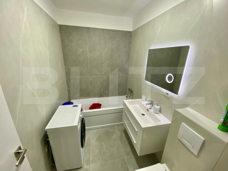 Apartament cu 2 camere semidecomandat, mobilat în Central