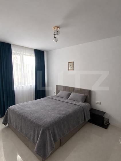 Apartament cu 2 camere semidecomandat, mobilat în Chinteni
