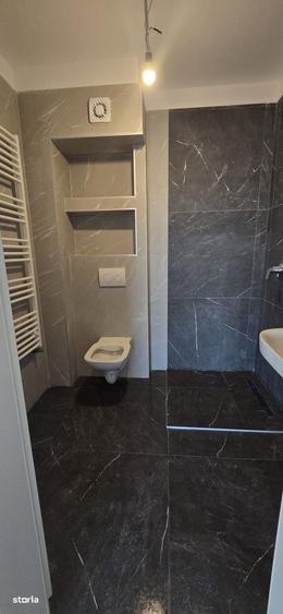 Apartament cu 3 camere în Tractorul