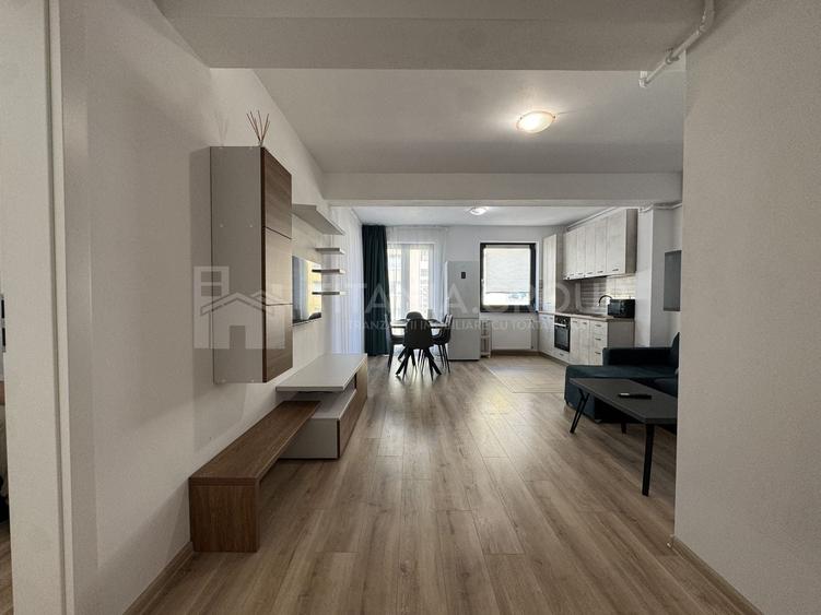 Apartament cu 2 camere semidecomandat, mobilat în Tractorul