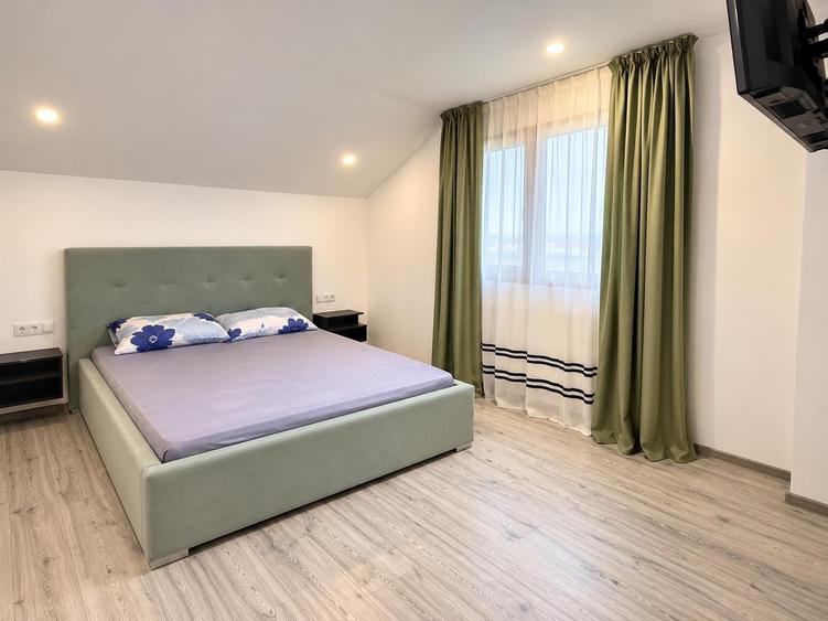 Casă individuală cu 4 camere cu Garaj în Periferie