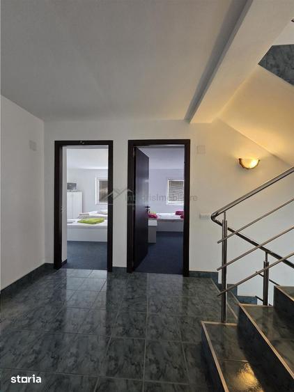 Casă cu 10 camere cu Teren 300 Mp în Sânmartin
