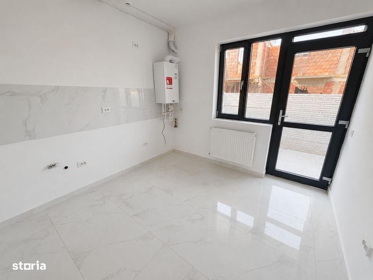 Casă cu 4 camere cu Teren 200 Mp în Central