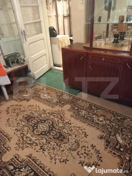 Casă cu 2 camere cu Teren 2000 Mp în Central