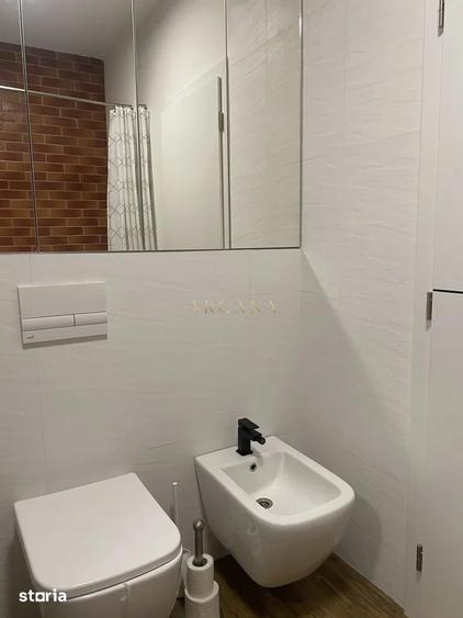 Apartament cu 3 camere semidecomandat, mobilat în Borhanci