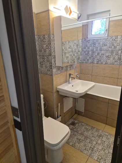 Apartament cu 2 camere semidecomandat, mobilat în Titan