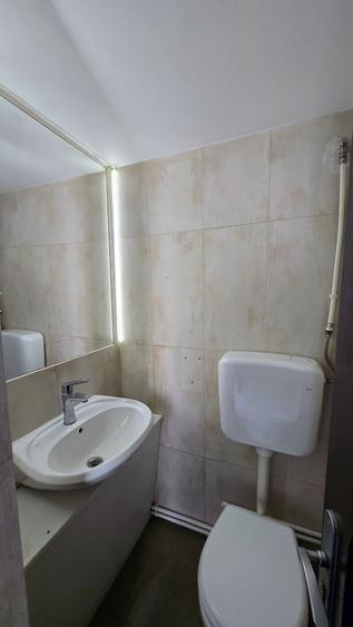 Strada Mircea cel Batran - Casa demisol (58mp)+parter (69mp) /teren 150 mp - 11