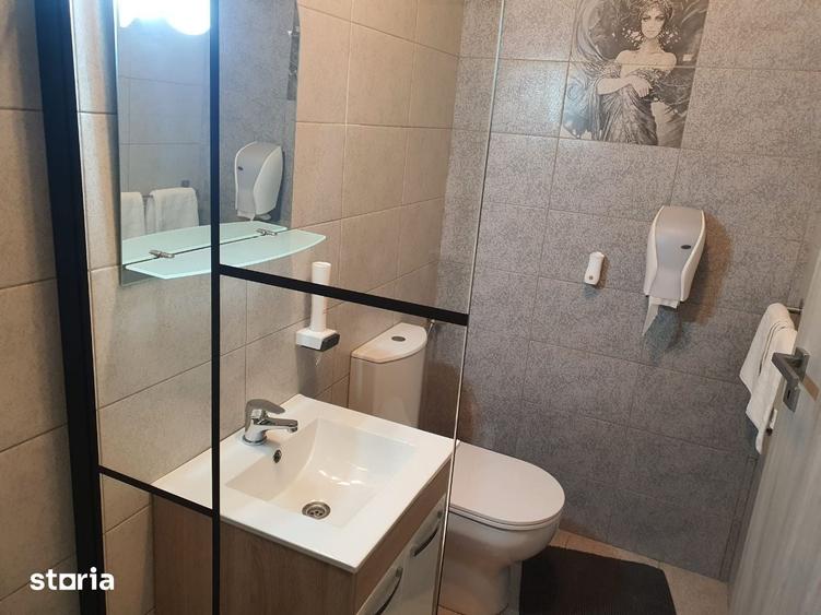 Casă cu 7 camere cu Teren 1500 Mp în Sânmartin