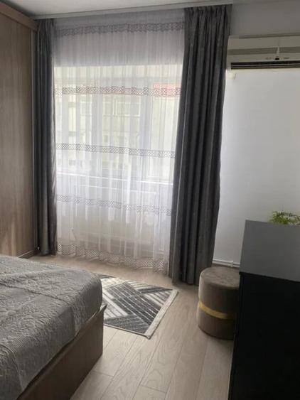 Apartament cu 2 camere decomandat în Podul de Fier