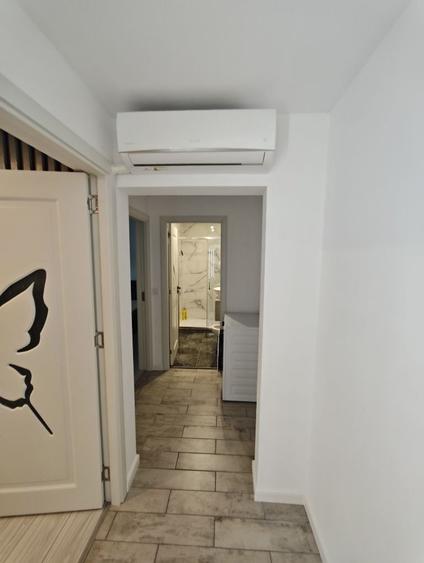 Apartament cu 2 camere decomandat în Romanești