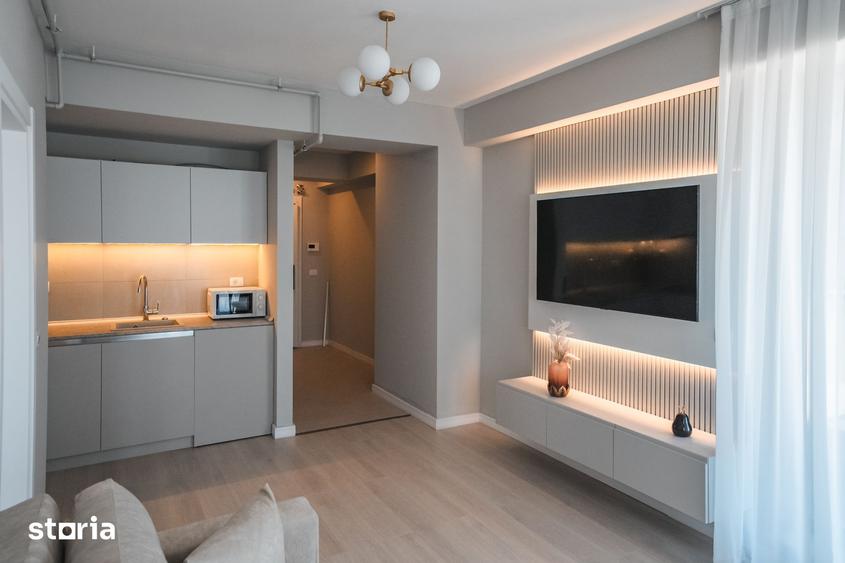 STUDIO CU DORMITOR SEPARAT - MOBILAT UTILAT LUX- SOLID SEA VIEW PERLA - 18