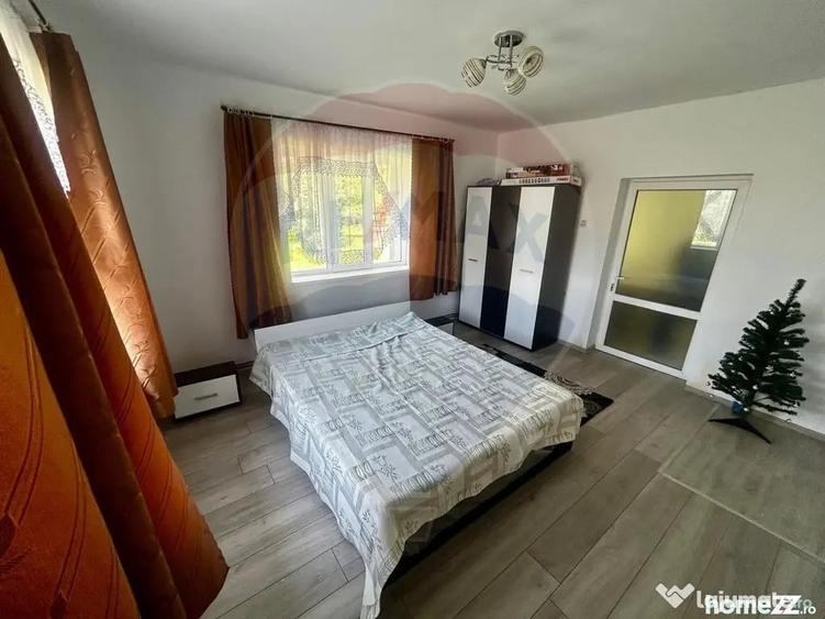 Casă cu 3 camere cu Teren 1500 Mp în Aciua
