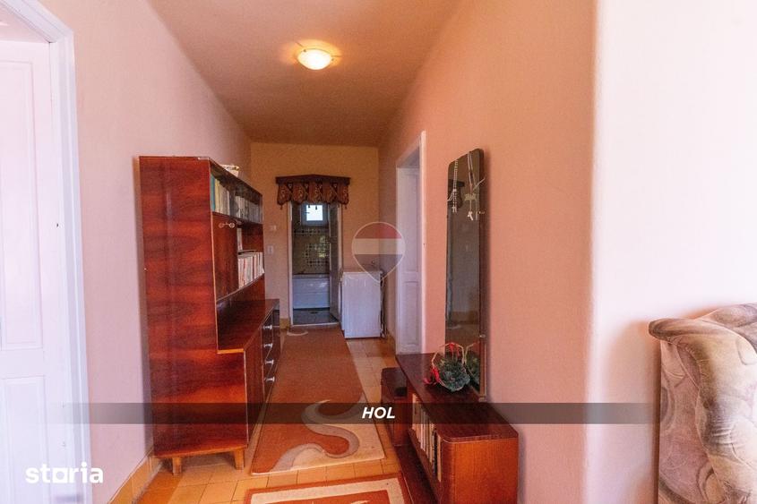 Casă cu 2 camere cu Teren 1300 Mp în Copalnic
