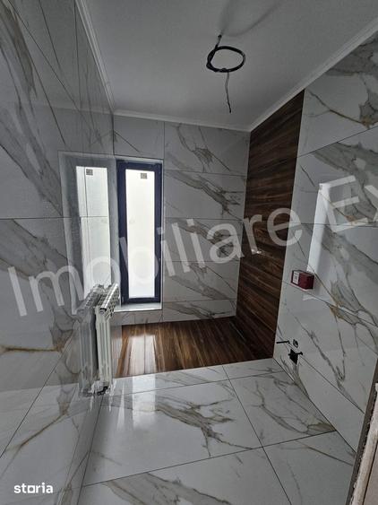 Casă cu 4 camere cu Teren 1000 Mp în Băiculești