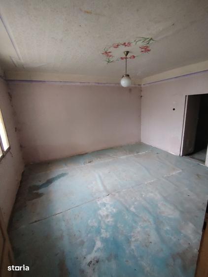 Casă cu 4 camere cu Teren 1554 Mp în Central