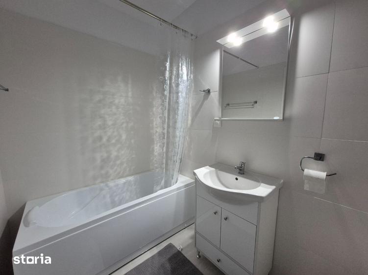 Bdul Bucuresti, nou, ap 2 camere cu centrala si AC, 450 euro, et 4/9 - 11