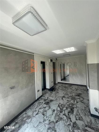 Apartament cu 3 camere semidecomandat în Central