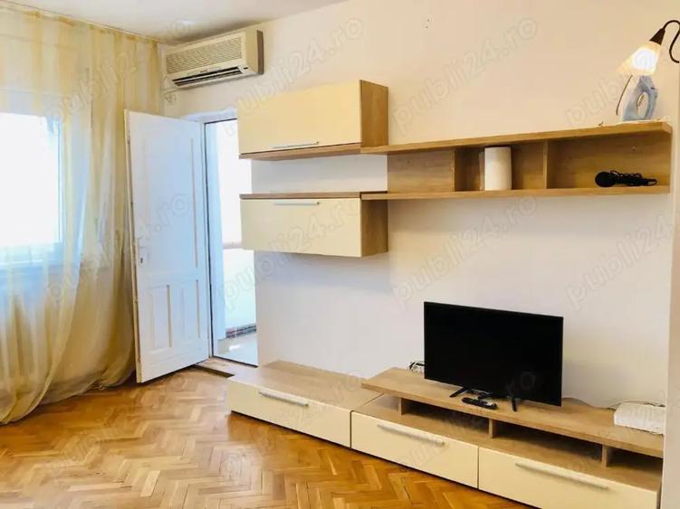 Apartament cu 4 camere decomandat, mobilat în P-ța Unirii