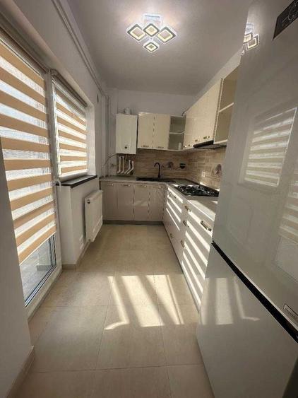 Apartament cu 3 camere decomandat în Bucium