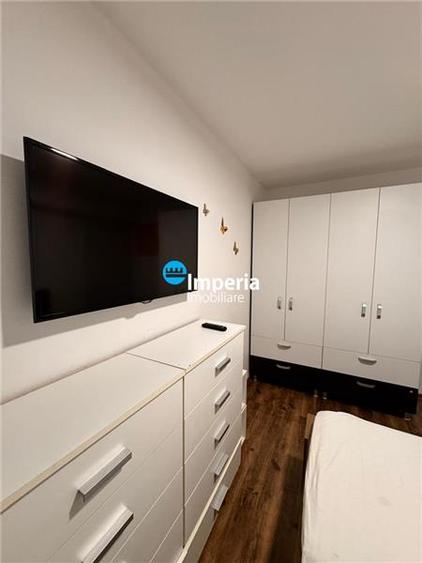 Apartament cu 4 camere decomandat, mobilat în Breazu