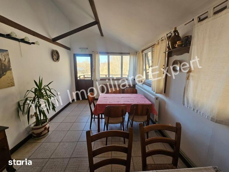 Casă cu 5 camere cu Teren 8000 Mp în Curtea de Argeș