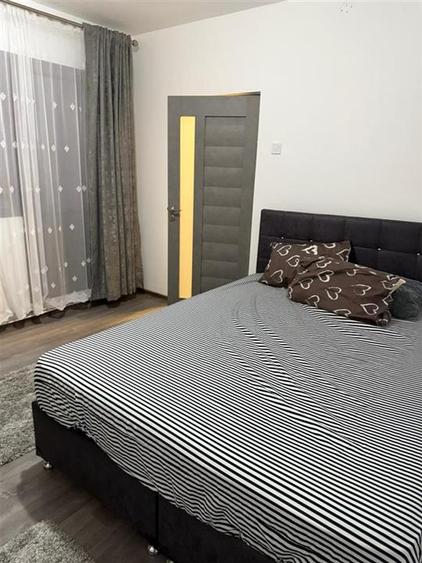 Apartament cu 2 camere semidecomandat, mobilat în Podu Roș
