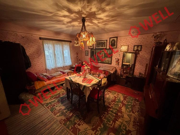 Casă cu 2 camere cu Teren 1189 Mp în Brețcu