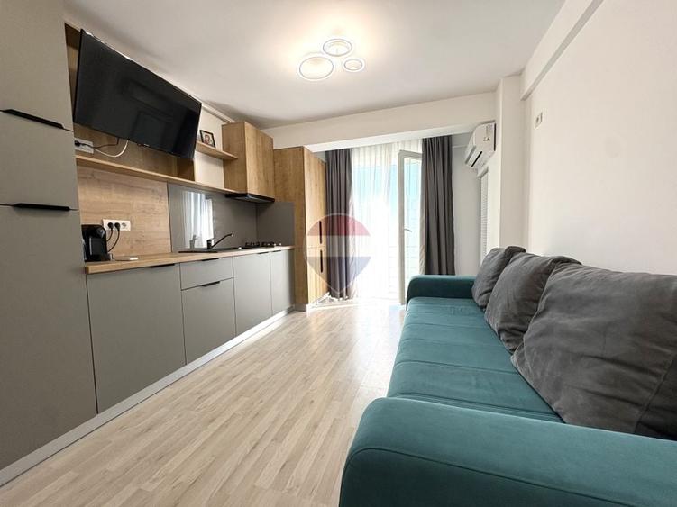 Apartament cu 2 camere semidecomandat, mobilat în Central