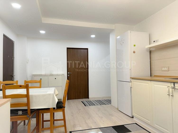 Apartament cu 3 camere decomandat în Tractorul